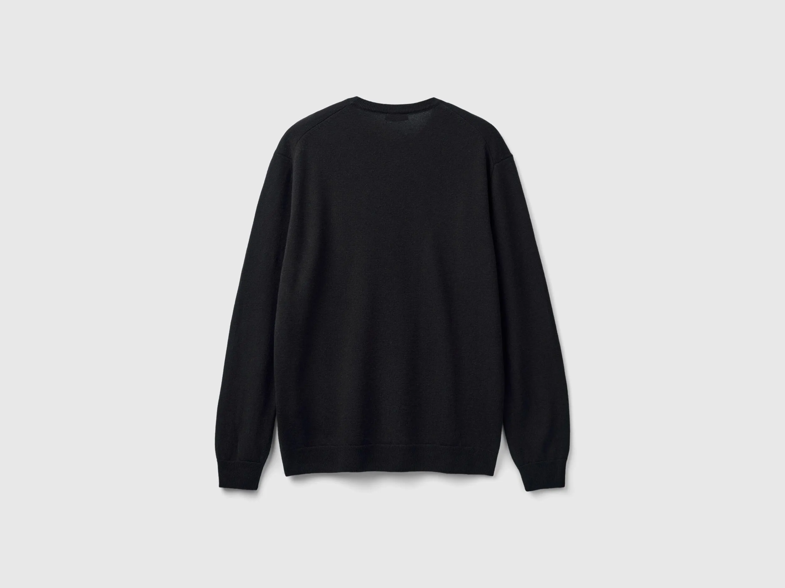 Black crew neck sweater in pure Merino wool - Black | Benetton